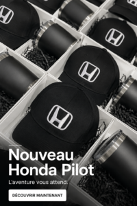 Vue avant du nouveau Honda Pilot sur route.